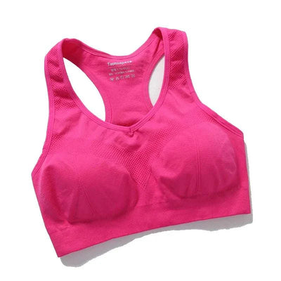 Pink seamless women sports bra with breathable mesh and push-up support for gym workouts