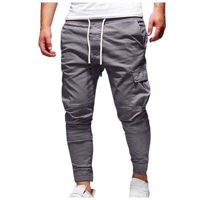 Men's grey outdoor waterproof hiking pants with drawstring and pockets, breathable and quick-dry for camping summer hiking