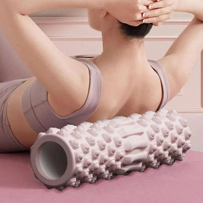 Foam muscle massage roller with textured surface for deep tissue therapy and muscle recovery