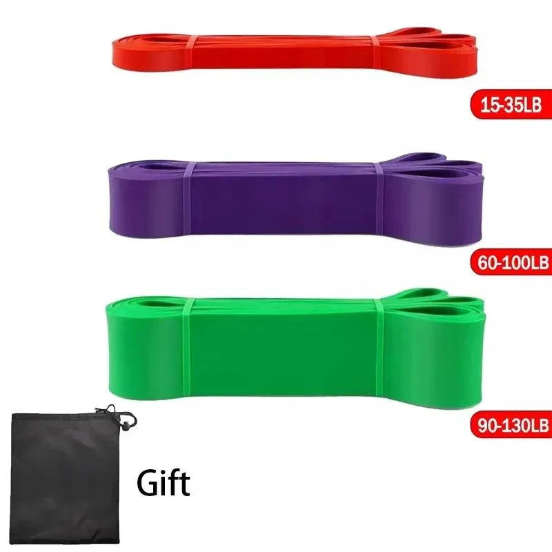 Heavy-duty resistance bands set with pull-up assist in red, purple, and green, including a black gift pouch for strength training