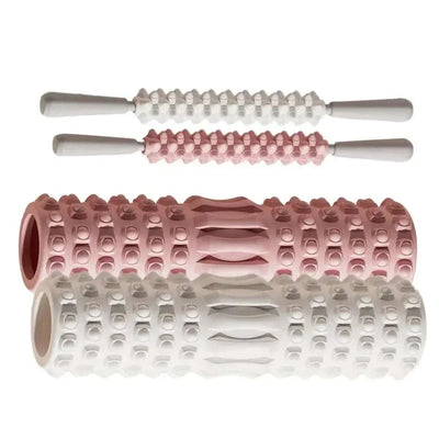 Set of pink and white foam muscle massage rollers with textured surfaces and handles for muscle recovery and fitness therapy