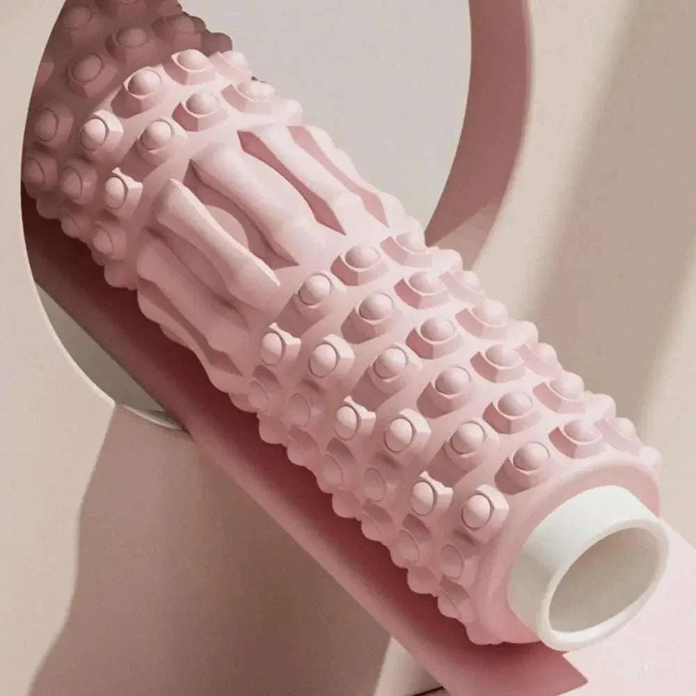 Pink textured high density foam muscle massage roller for body recovery and fitness therapy