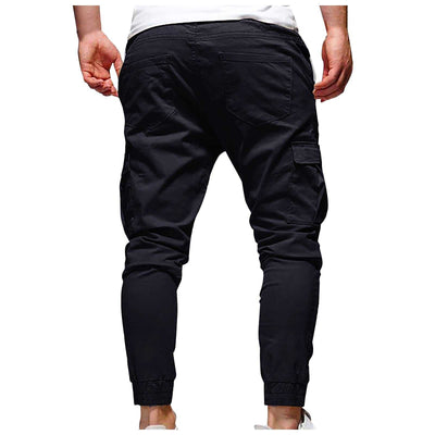Men's black outdoor waterproof hiking pants with drawstring and pockets, breathable and quick-dry, ideal for camping and summer hiking.